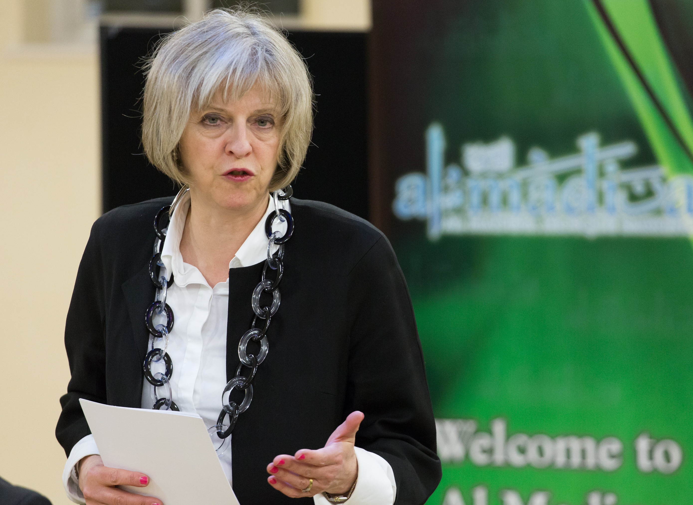 Image ©Licensed to i-Images Picture Agency. 12/02/2015. Barking, United Kingdom. Theresa May visits Al Madina Mosque. The Home Secretary Theresa May meets with students from the Young Leaders Programme, spiritual leaders, and community representatives in a visit to Al Madina Mosque in East London. Picture by Daniel Leal-Olivas / i-Images