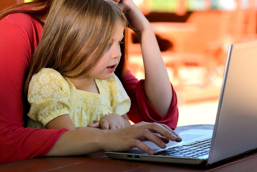 Child uses computer