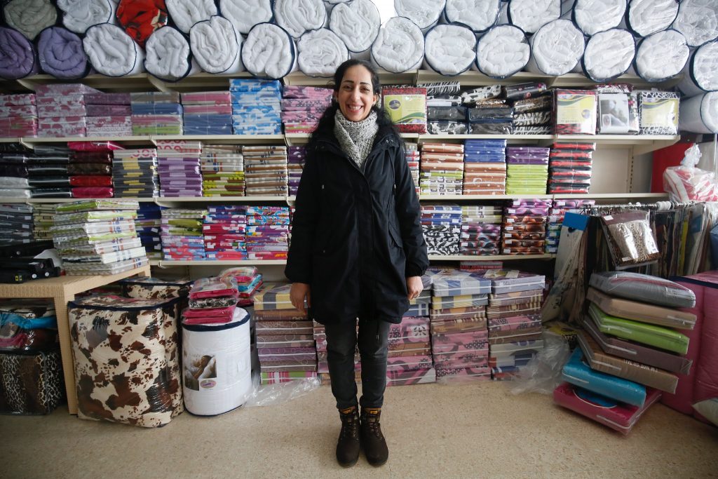 Sawsan, a Syrian refugee from Damascus, who is now working as an accountant in a textile manufacturing business in Lebanon.